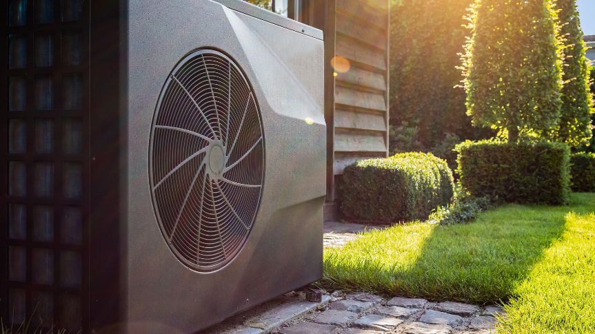A heat pump installed in the back garden of a UK home