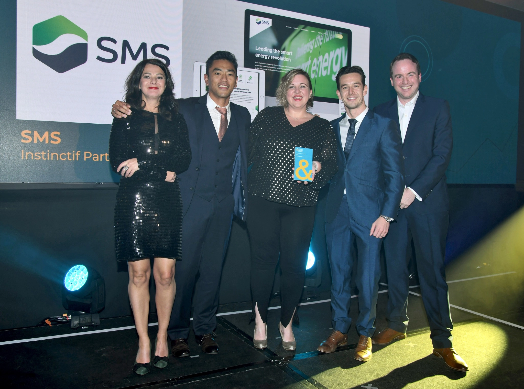 Image: SMS team accepting an award at a ceremony